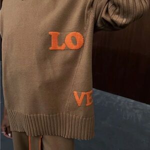 Never Fully Dressed Brown Sweater with Orange Lettering and matching pants